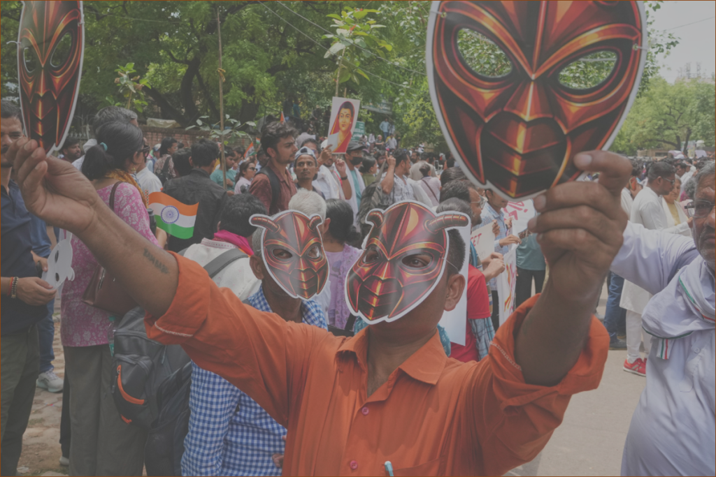 Masses Don Masks as Backers of India’s Trending ‘Cockroach People’s Party’ Kick Off Initial Protest