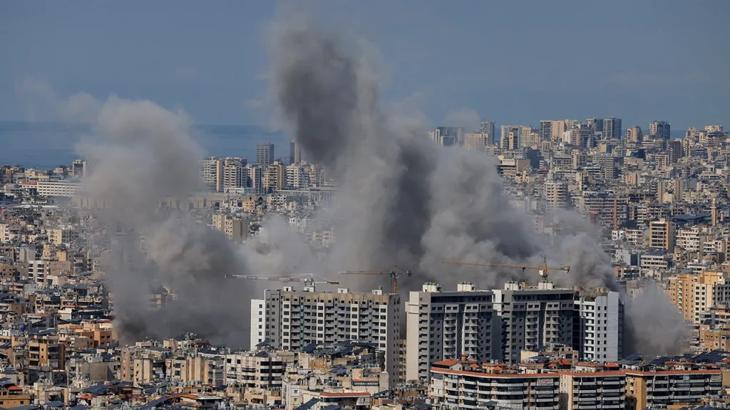 Israel Hits Hezbollah Positions in Beirut Following Rocket Ceasefire Breach