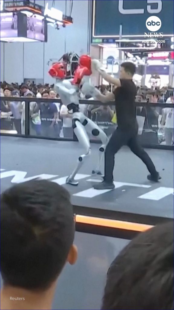 Human vs. Machine: The Epic Showdown of a Boxer and a Robot at Chinese Tech Expo